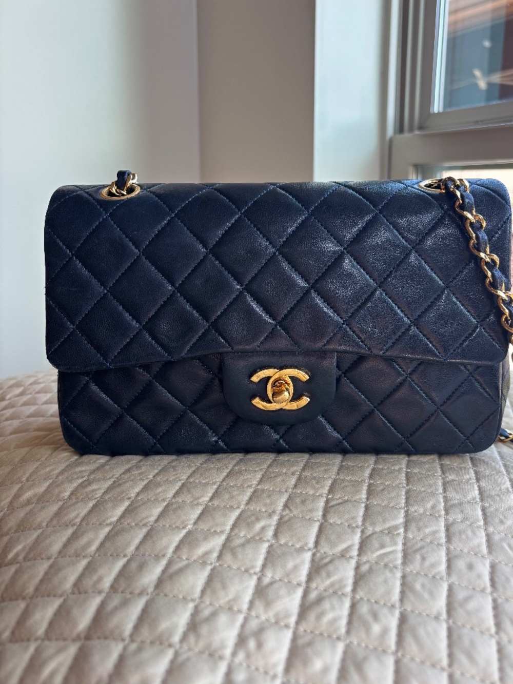 Rare Find of a 24K gold-plated Vintage Chanel Double Flap Navy Chanel Bag.